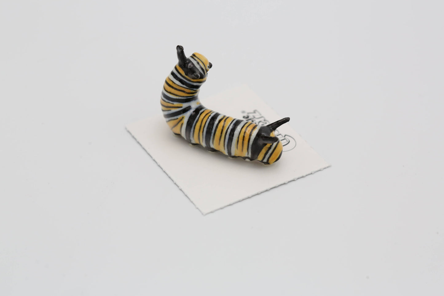 Porcelain Jojo The Monarch Caterpillar Figurine