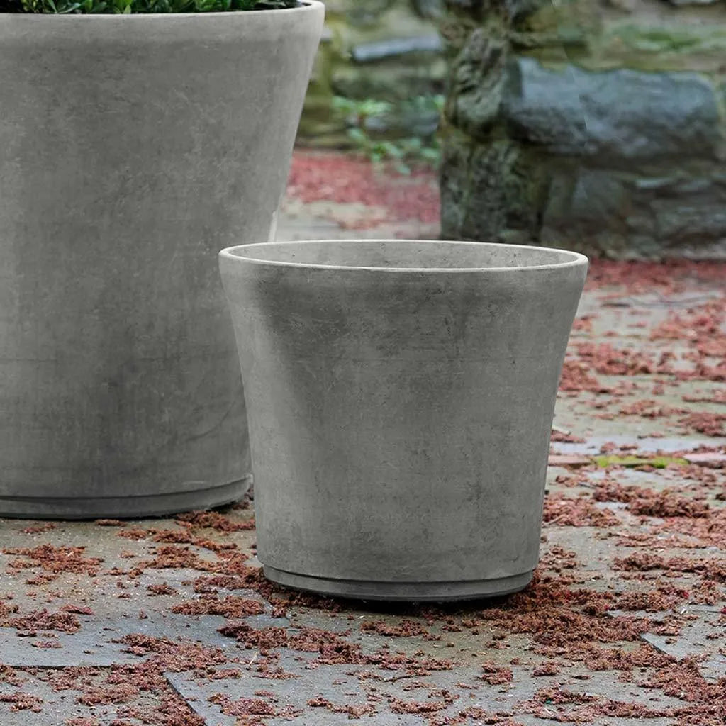 Medium gray cloche planter in SkinnyCrete on stone terrace, outdoor modern garden decor